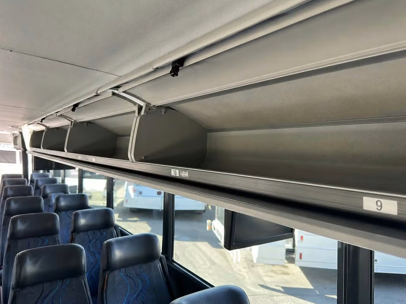 coachella 56 passenger charter bus overhead storage