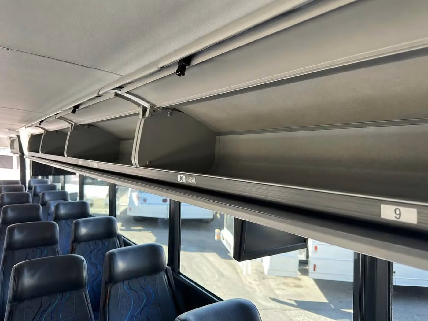 coachella charter bus overhead storage